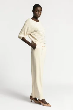Pull met lurex en fantasiesteek