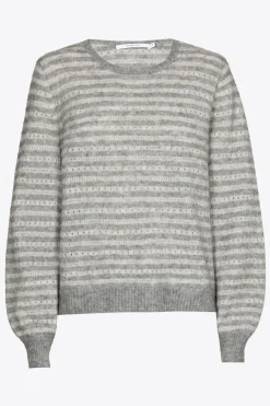 Pull met subtiele pailletten