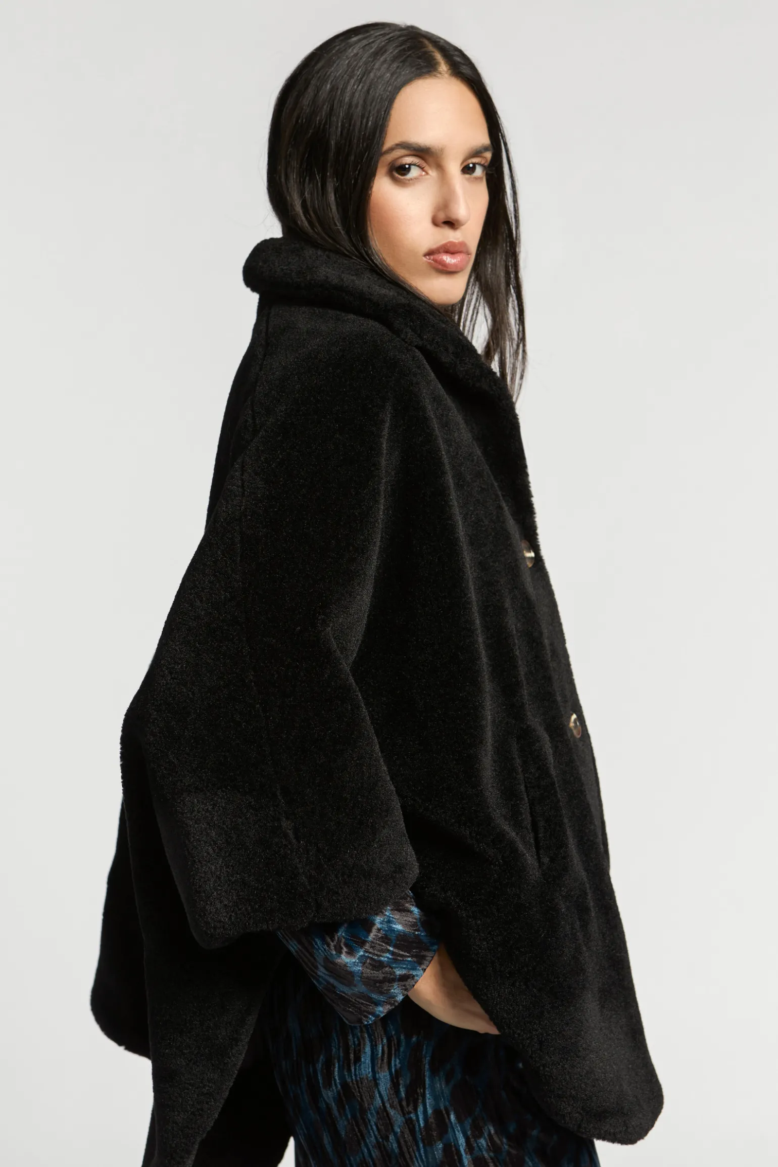 Zachte poncho in teddystof