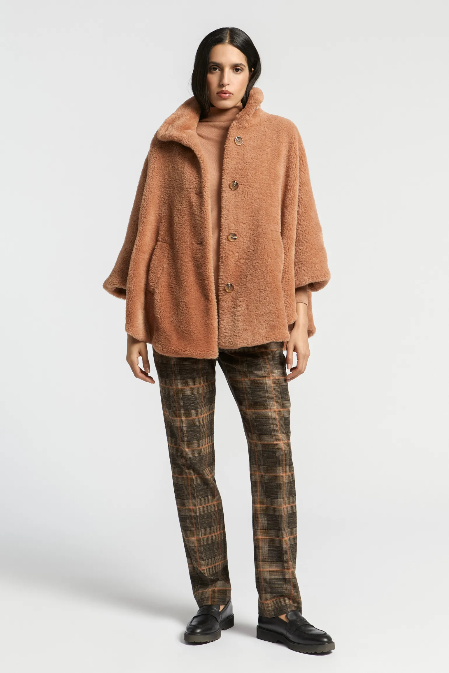 Zachte poncho in teddystof